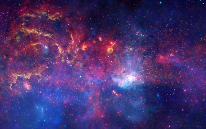 绚丽多彩的星云与繁密星空组成的宇宙背景。