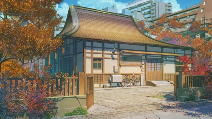 一座传统日式建筑坐落在秋日树木与现代城市建筑之间。