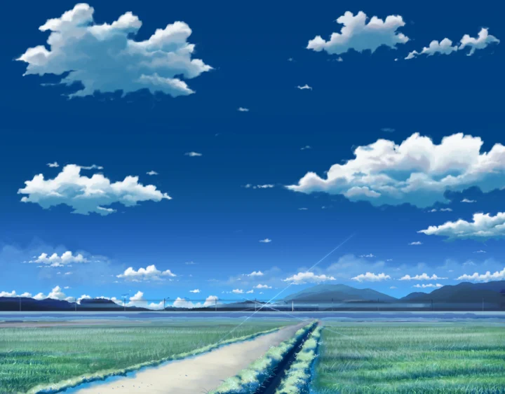 青空の下、白い雲や遠くの山々、緑の田畑と田舎道が描かれた穏やかな自然風景です。