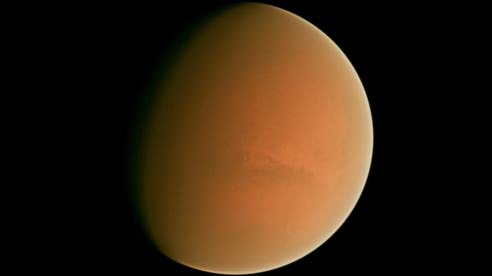 一个橙色行星悬浮在黑色太空背景中。