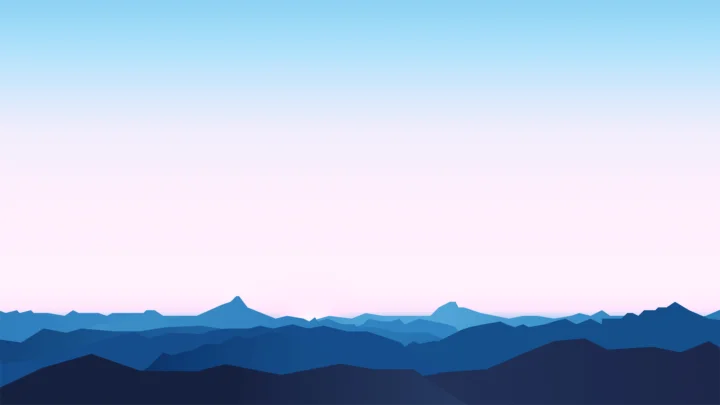 蓝色层叠群山映衬着由蓝转粉的渐变天空。