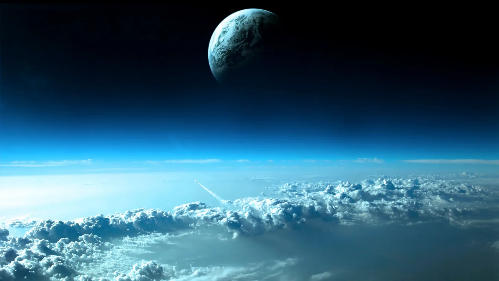 青緑色の惑星が暗い宇宙を背景に浮かび、その下に明るい雲海と大気の縁が広がっている。
