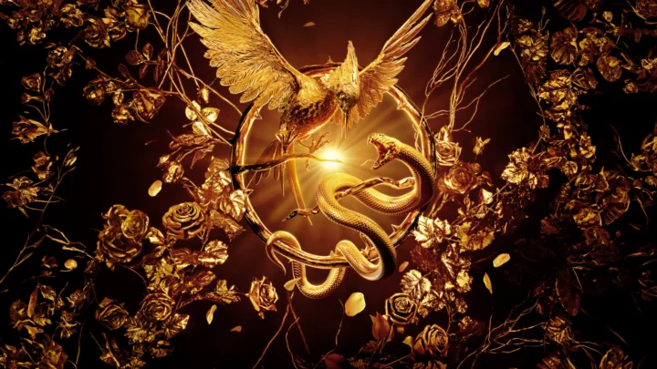 金色蜂鸟与蛇被繁复的金色花卉环绕，中央散发出温暖的光芒。