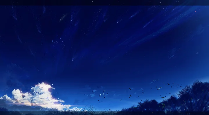 深蓝色天空下，白云、远处植被与草地构成宁静的自然风景。