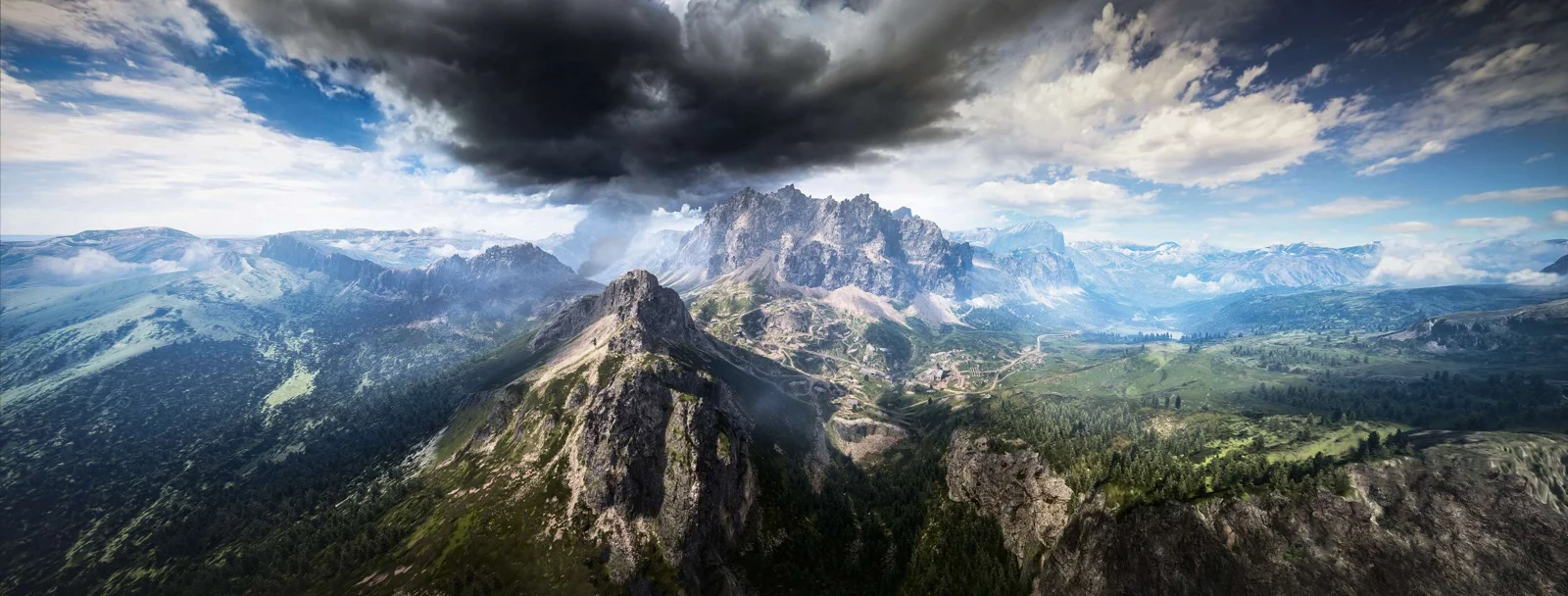 壯闊的山脈、森林與厚重雲層構成一幅寬幅自然全景。